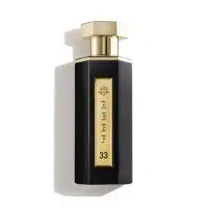 Parfum Reef 33 en flacon noir et doré avec safran et fleurs violettes