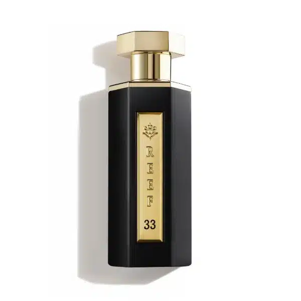 Parfum Reef 33 en flacon noir et doré avec safran et fleurs violettes